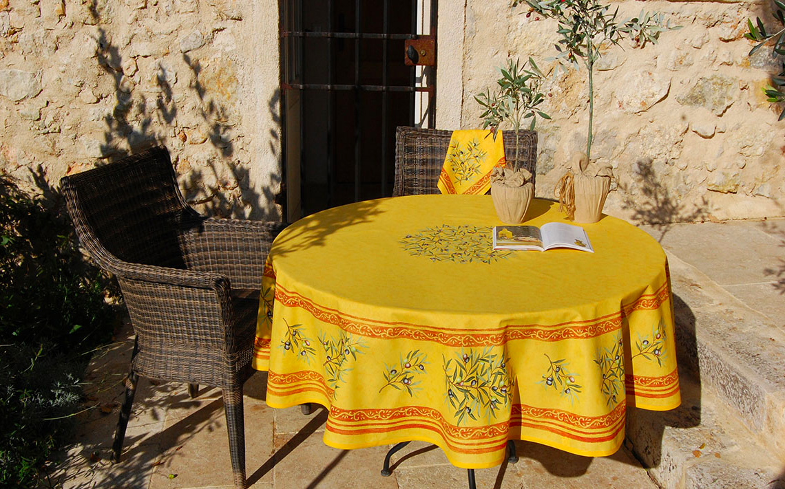 French Acrylic Coated Tablecloth Collection "Clos" Saffron: Olives Motif, Placed Pattern, Round D.71", Seats 4 - 6 people, Price $114.95